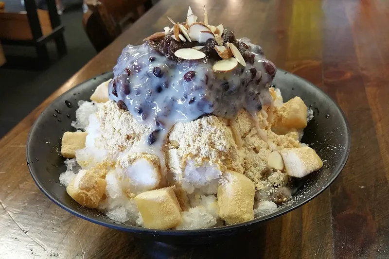 Korean shaved ice dessert with blueberries, almonds and rice cake at Sodam