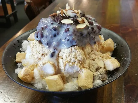 Korean shaved ice dessert with blueberries, almonds and rice cake at Sodam