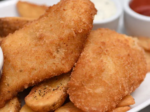 Battered halibut and chips with tartar sauce at Duke’s Seafood