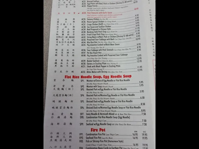 Scanned Canton Chinese Restaurant menu page listing more authentic Chinese dishes, flat rice noodle and egg noodle soups and fire pot with prices