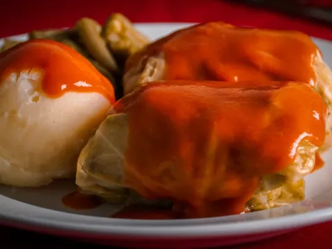 Stuffed cabbage (golabki) in tomato sauce with mashed potatoes and green beans at Polish Village Cafe in Hamtramck