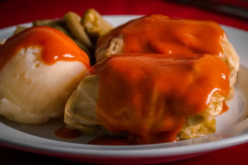 Stuffed cabbage (golabki) in tomato sauce with mashed potatoes and green beans at Polish Village Cafe in Hamtramck