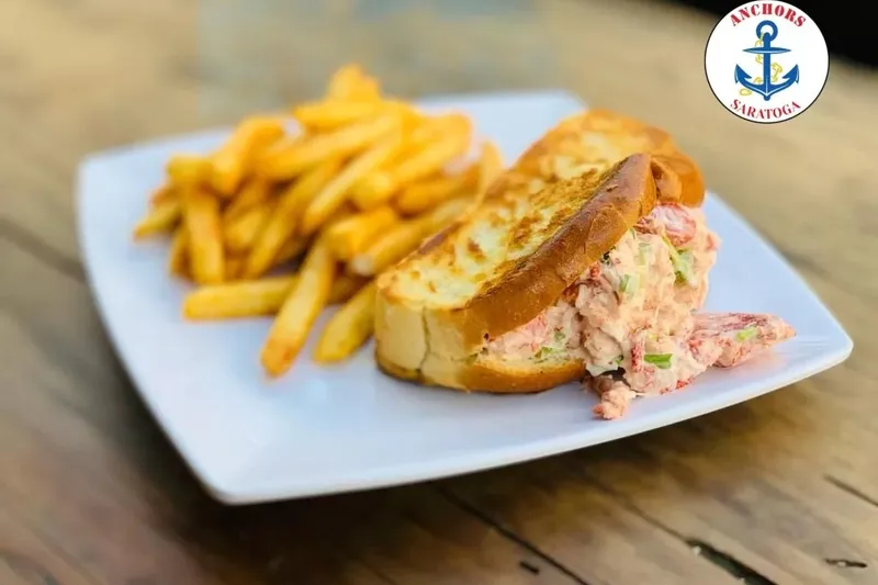 A lobster roll with fries from Anchors Fish & Chips And Seafood Grill in Saratoga.