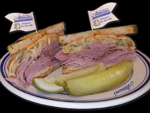 Reuben sandwich with pickle spears at Attman's Delicatessen