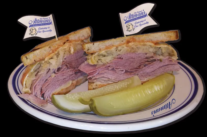 Reuben sandwich with pickle spears at Attman's Delicatessen