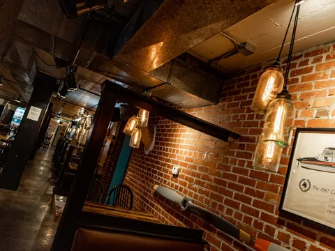 Exposed brick dining room interior at Public at the Brickyard