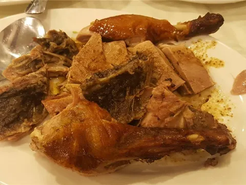 B.B.Q. roast duck served on a white plate at Hop Woo, Los Angeles