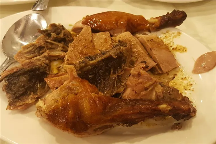 B.B.Q. roast duck served on a white plate at Hop Woo, Los Angeles