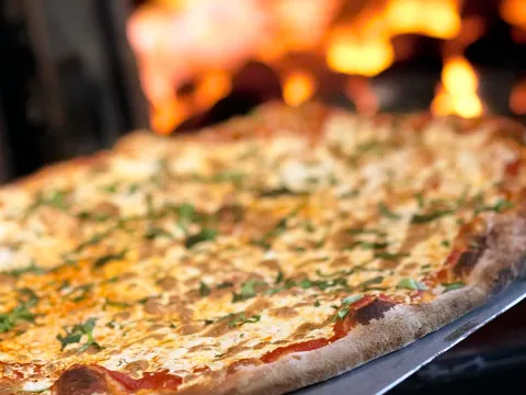 Pizza fresh out of the wood-fired oven at Centro