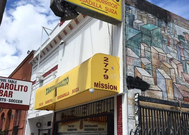 Yellow Taqueria El Farolito storefront and marquee sign reading Tacos, Burritos, Quesadilla Suiza at 2779 Mission Street in San Francisco