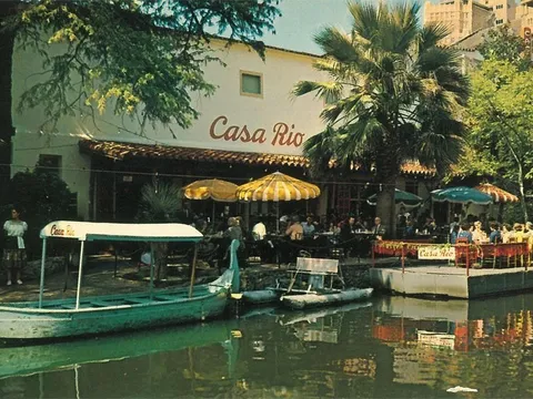 Historic photo of Casa Rio's River Walk patio and boat dock