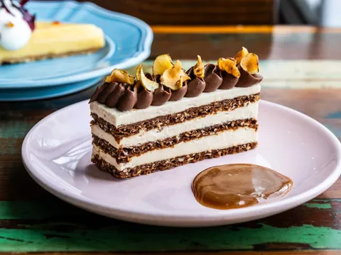 Layered chocolate cream cake at Odd Duck