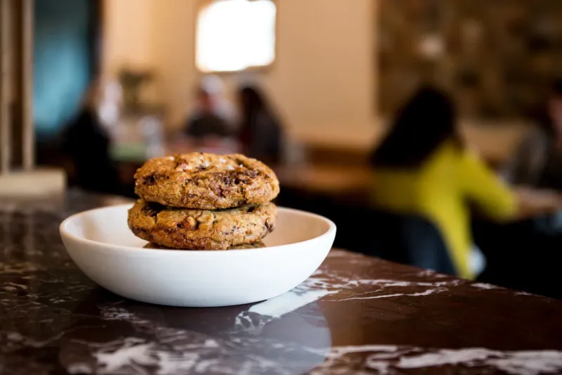 Dining room and seasonal dishes at Coquine