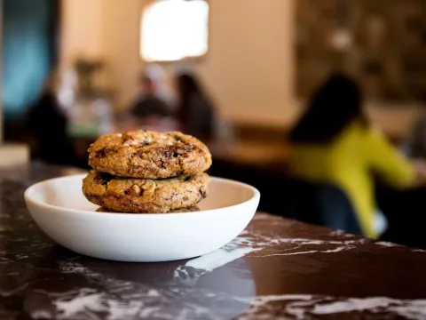 Dining room and seasonal dishes at Coquine