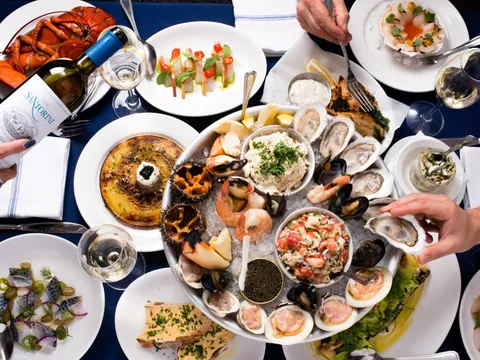 Raw bar seafood tower with oysters, lobster and caviar at Neptune Oyster