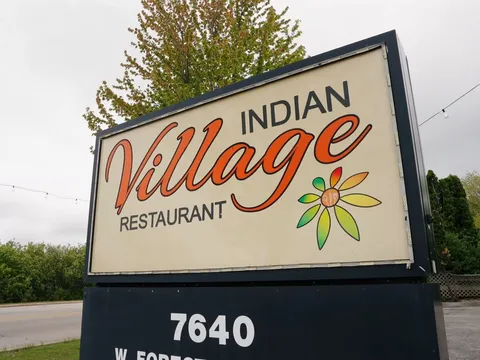 Indian Village Restaurant roadside sign at 7640 West Forest Home Avenue in Greenfield