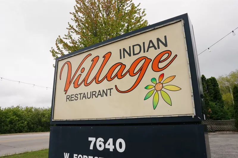 Indian Village Restaurant roadside sign at 7640 West Forest Home Avenue in Greenfield