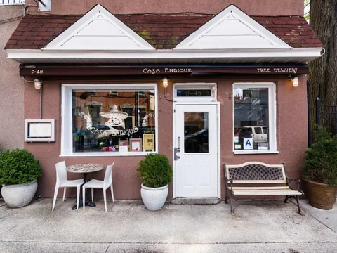 Storefront and sidewalk seating at Casa Enrique