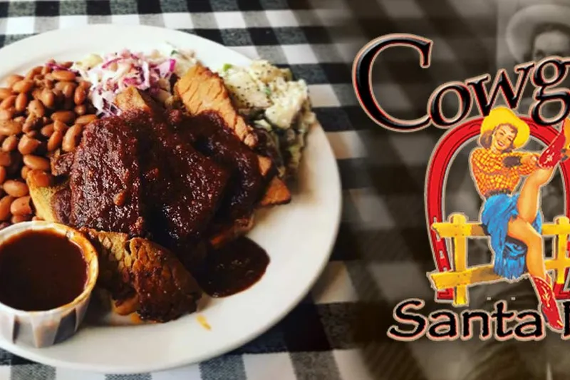 BBQ platter with pinto beans, coleslaw, and potato salad at Cowgirl BBQ