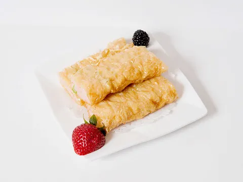 Fresh bean curd skin rolls stuffed with shrimp on a white plate at Asian Jewels Seafood Restaurant, Flushing