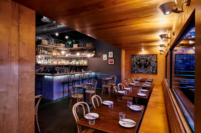 Interior dining room and marble bar at Emmy Squared Pizza in The Gulch, Nashville