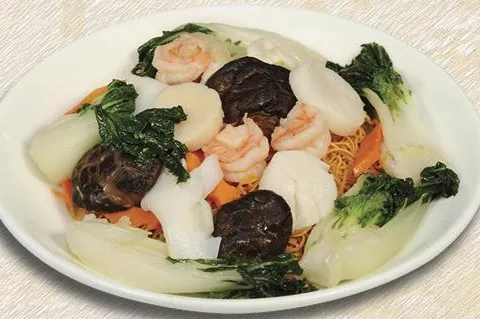 Pan-fried noodles topped with prawns, scallops, black mushrooms and baby bok choy at Great Eastern Restaurant