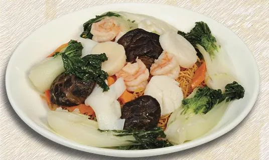 Pan-fried noodles topped with prawns, scallops, black mushrooms and baby bok choy at Great Eastern Restaurant
