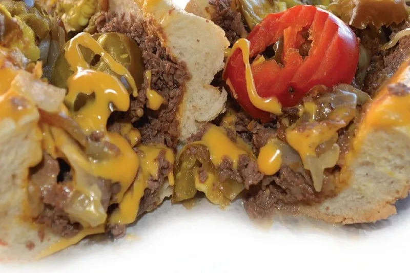 Cheesesteak with peppers and cheese at Jim's Steaks South Street