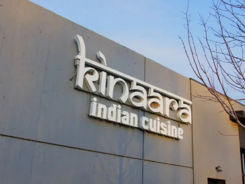 Kinaara Indian Cuisine exterior sign on the restaurant's building in Omaha