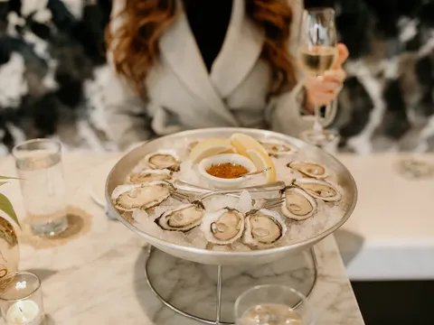A platter of raw oysters on ice at Easy Bistro & Bar