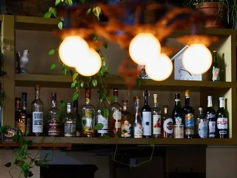 Back bar and pendant lights inside Le Pigeon in Portland