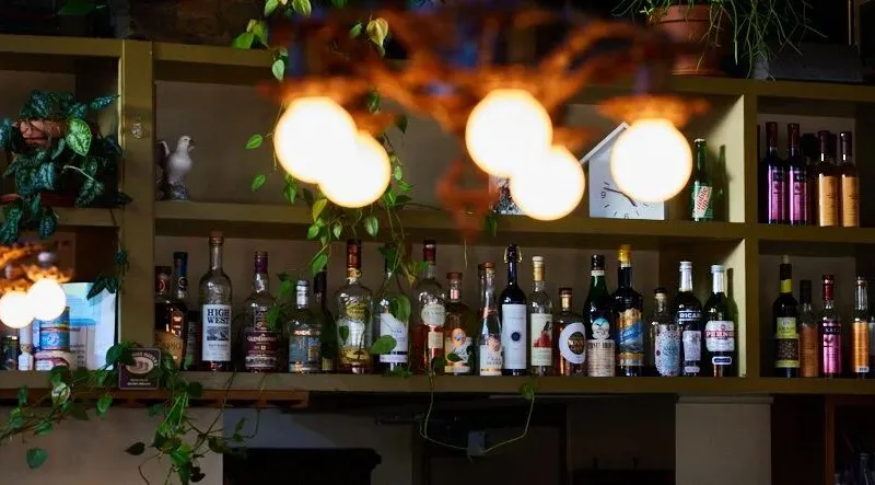 Back bar and pendant lights inside Le Pigeon in Portland