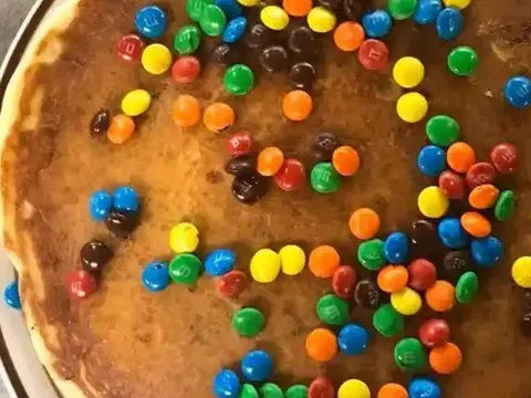 A pancake topped with M&M's candy at Hanover Pancake House