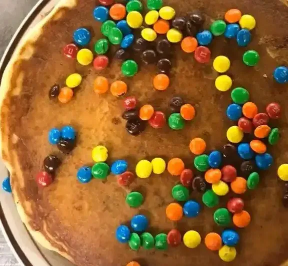 A pancake topped with M&M's candy at Hanover Pancake House