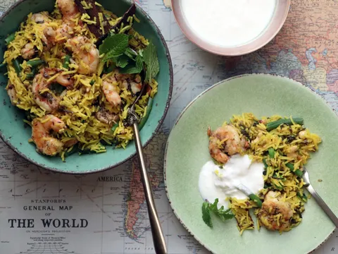Minted shrimp pulao with green beans, mint and a bowl of yogurt, from Pondicheri in Houston