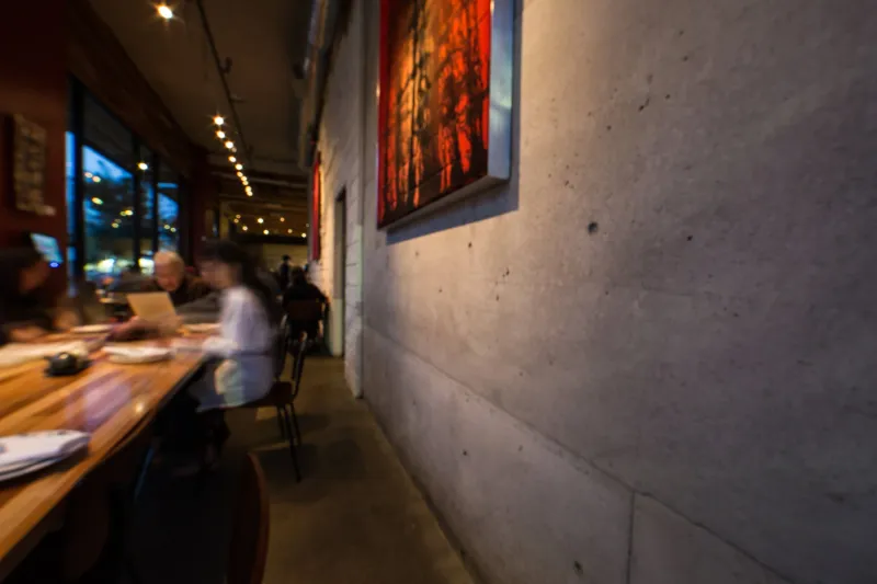 Dining room with a long communal table at Great China