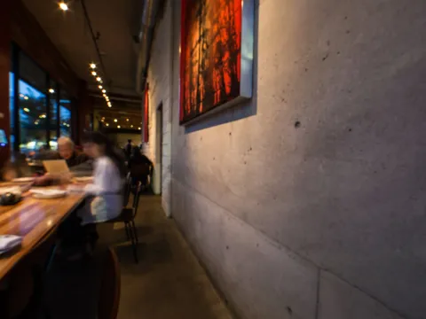 Dining room with a long communal table at Great China