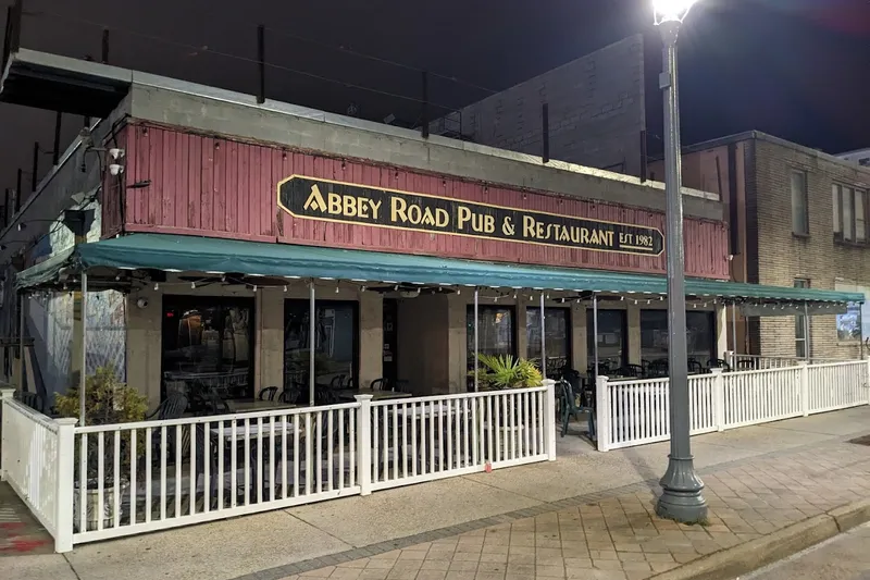 Abbey Road Pub & Restaurant storefront at night, est. 1982