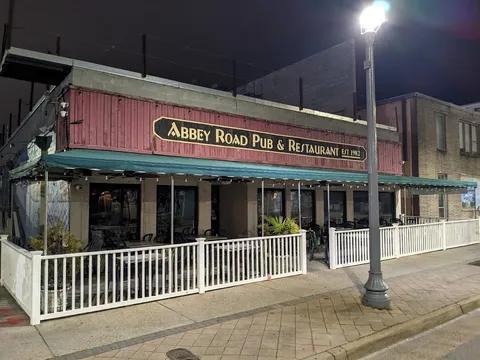 Abbey Road Pub & Restaurant storefront at night, est. 1982