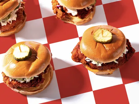 Hot chicken sandwiches with pickles at Hattie B's Hot Chicken