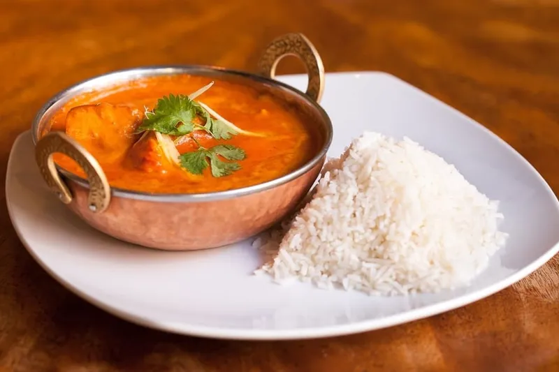 Tikka masala with rice served at East India Co. Grill & Bar in Portland