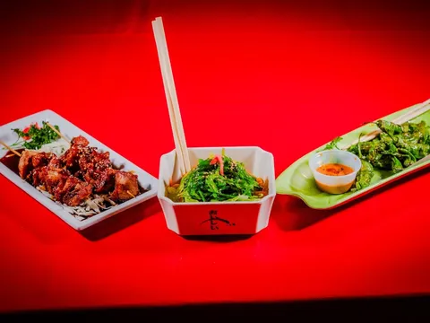 Fujiyama sushi and dishes on a red background