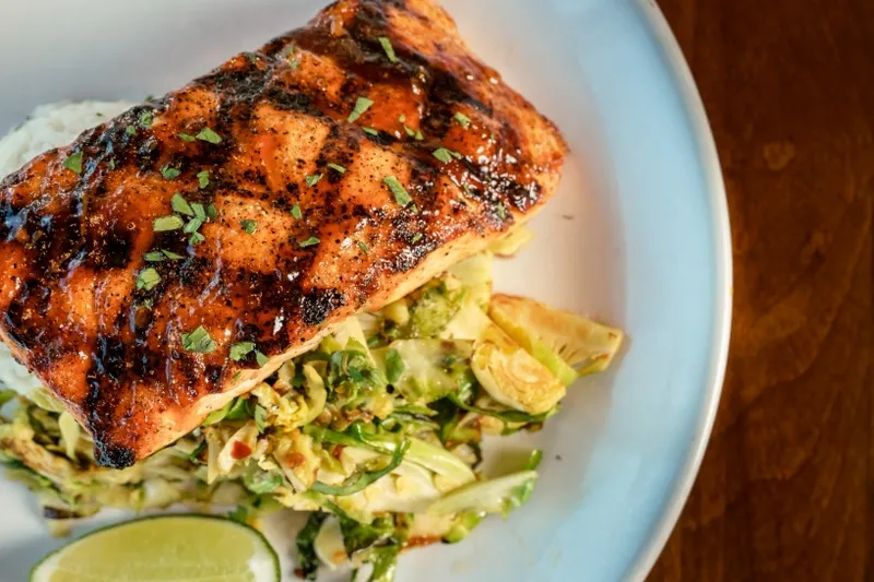 Blackened salmon fillet served over a slaw at Thames Landing