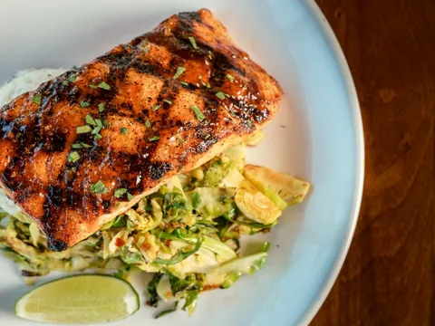 Blackened salmon fillet served over a slaw at Thames Landing