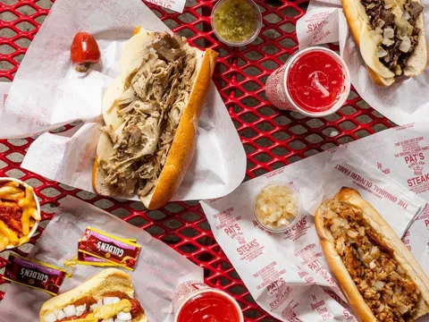 Cheesesteaks, hot dogs, and fries at Pat's King of Steaks
