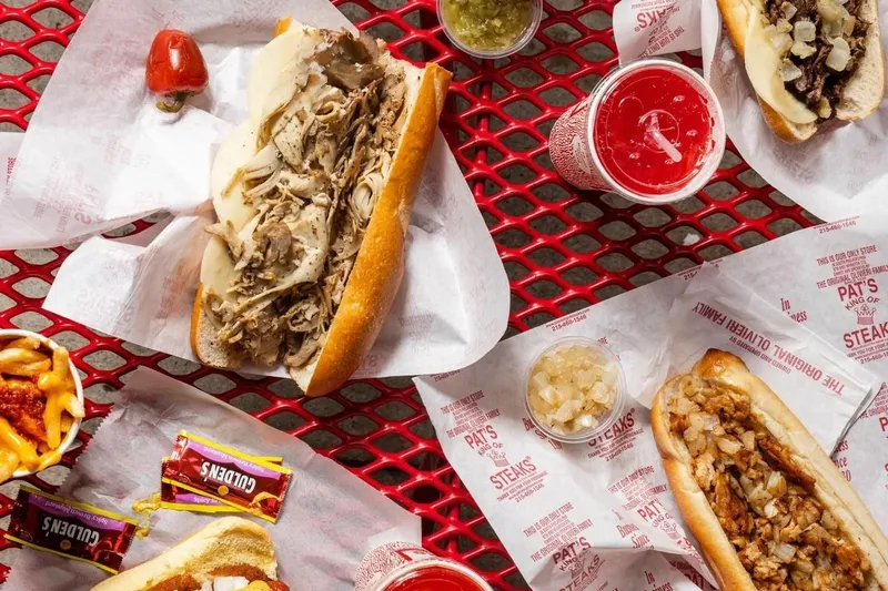 Cheesesteaks, hot dogs, and fries at Pat's King of Steaks