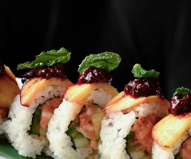 Peach and mint topped sushi roll at RED
