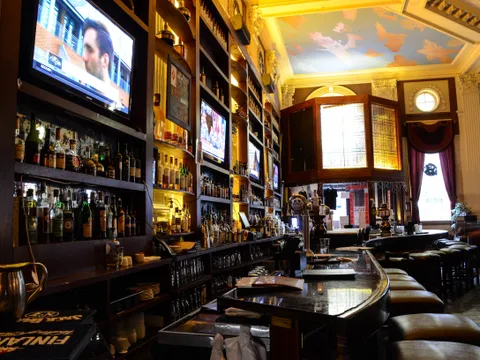 Bar and dining room with a painted ceiling at Han Dynasty