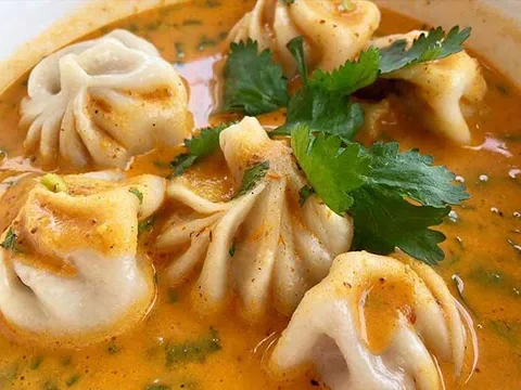 Jhol momo served in spiced broth at Taste of the Himalayas
