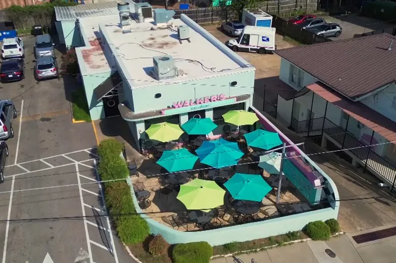 Aerial view of Walker's Drive In and its umbrella-shaded patio in Fondren
